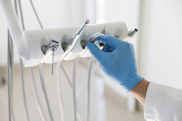 Professional Root Canal Treatment technician working in Orleans Parish County, LA